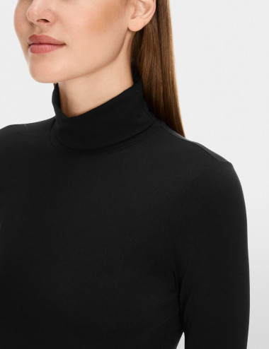 Délicat pull à col roulé...